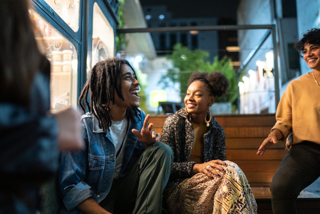 Friends having fun outdoors at night
